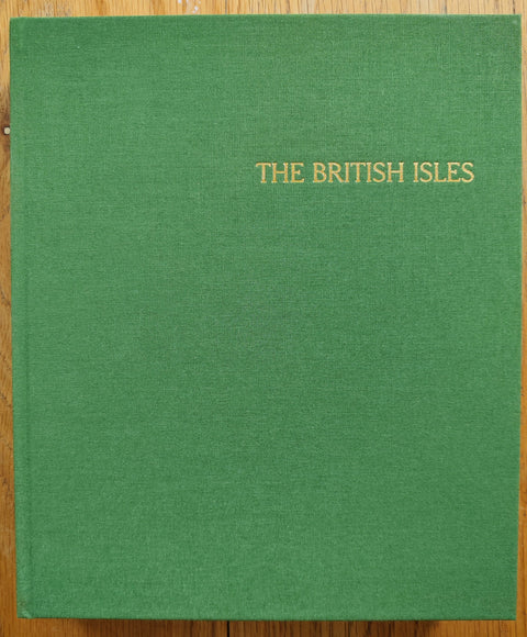 The photobook cover of The British Isles, 2007-2020 by Jamie Hawkesworth. In hardcover green. Signed.