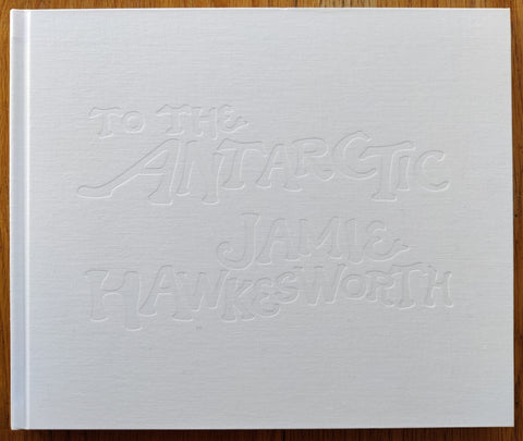 The photobook cover of To The Antarctic by Jamie Hawkesworth. Signed. In hardcover white.