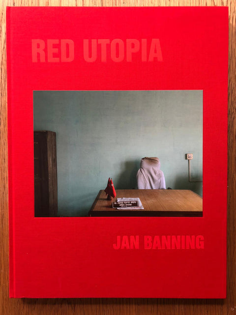 The photography book cover of Red Utopia by Jan Banning. Hardback in bright red.