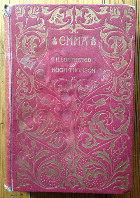 The book cover of Emma by Jane Austen. Hardback in red with gold pattern.