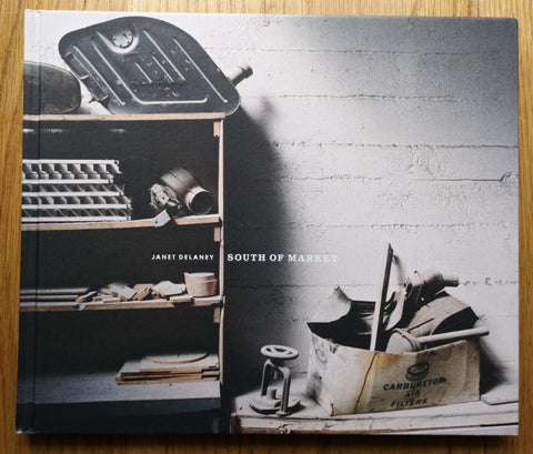 The photobook cover of South of Market by Janet Delaney. Hardback with image of tools. Signed.