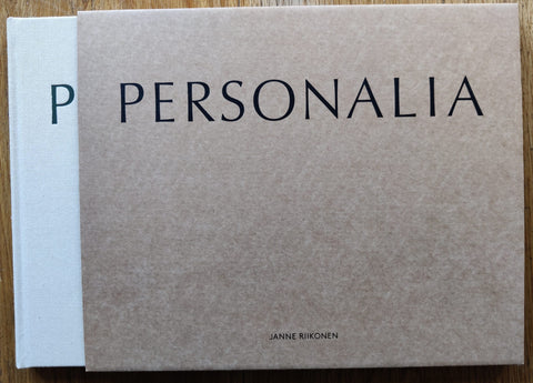 The photography book cover of Personalia by Janne Riikonen. In slipcased harcover beige.