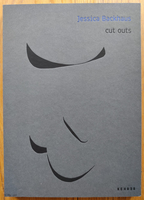 The photography book cover of Cut Outs by Jessica Backhaus. In hardcover black with exposed spine.