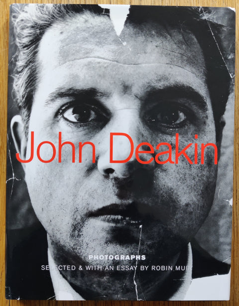 The photography book cover of John Deakin: Photographs by John Deakin. In dust jacketed hardcover black.