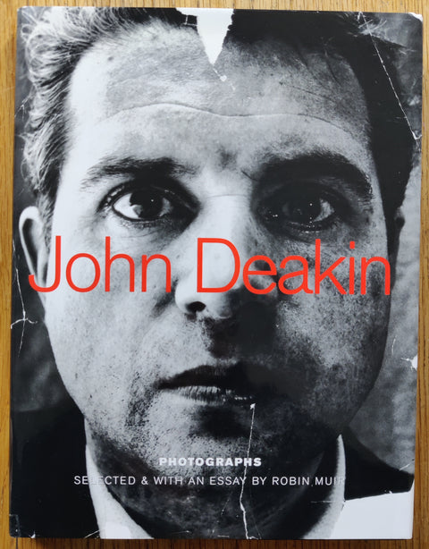 The photography book cover of John Deakin: Photographs by John Deakin. In dust jacketed hardcover black.