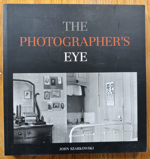 The photobook cover of The Photographer's Eye by John Szarkowski. In softcover black.