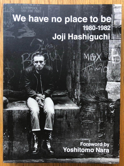 The photography book cover of We Have No Place To Be 1980-1982 by Joji Hashiguchi. Paperback in black and white. Signed.
