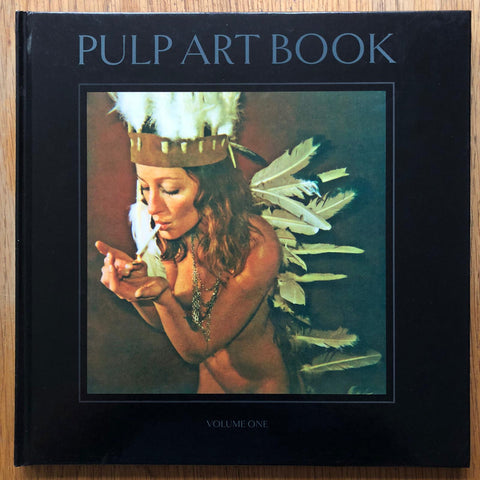 The photography book cover of Pulp Art Book by Joni Harbeck and Neil Krug. Hardback in black with image of a naked woman lighting a cigarette.