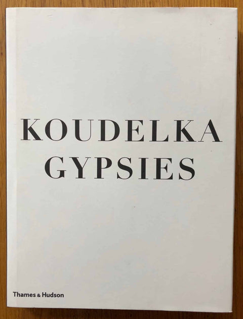 The photography book cover of Gypsies by Josef Koudelka. Hardback in white with black text.