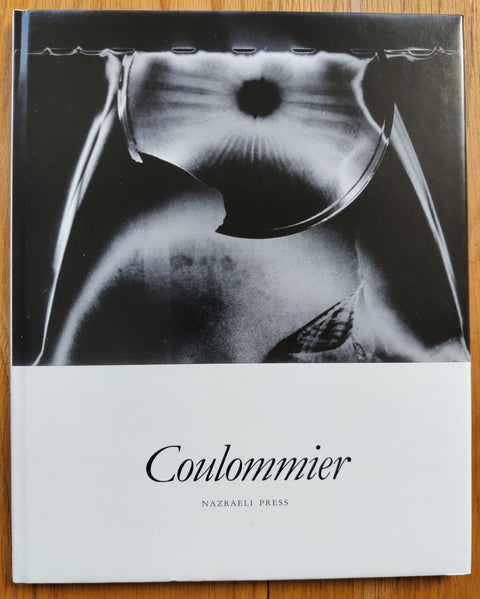 The photography book cover of Coulommier by Julien Coulommier. Hardback in black and white.