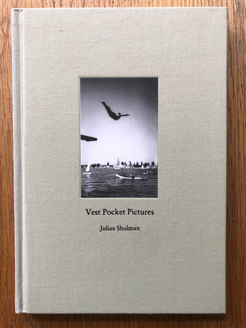 The photography book cover of Vest Pocket Pictures by Julius Shulman. Hardback in light grey.