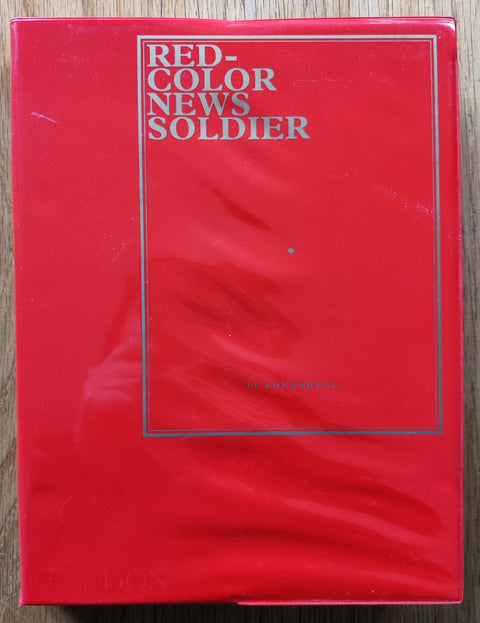 The photobooks cover of Red-Color News Soldier by Li Zhensheng. In red PVC jacket