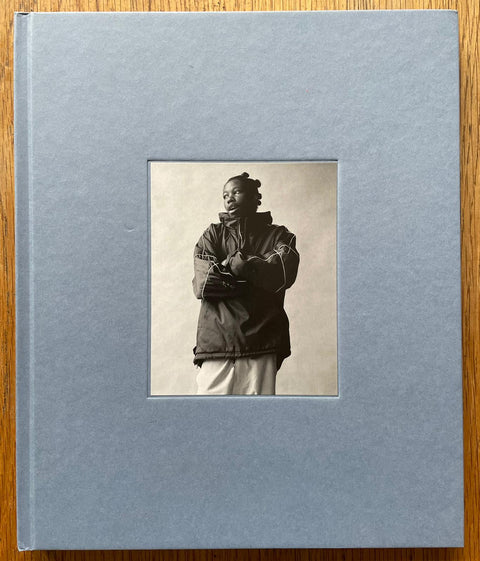 The photography book cover of Studio Portraits by Lola Pani. Hardback in grey.