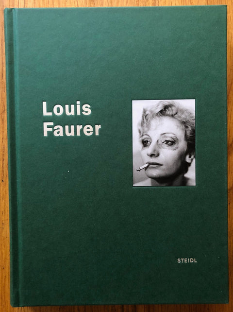 Louis Faurer by Louis Faurer. Hardback in green with a black and white image of a woman smoking on the cover.