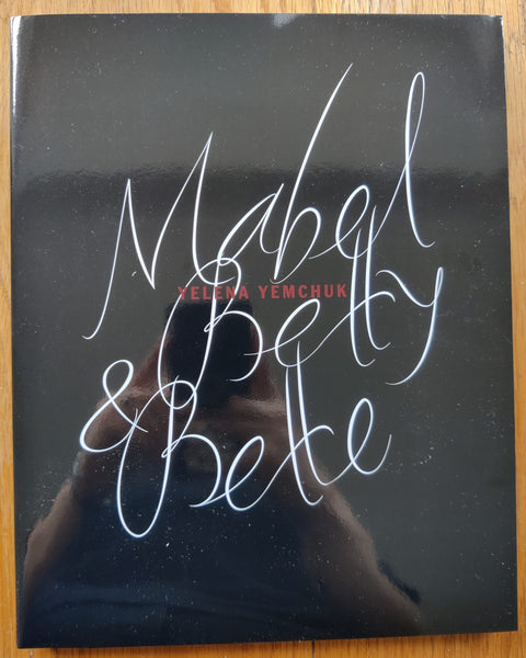 The photography book cover of Mabel, Betty & Bette by Yelena Yemchuk. Paperback in shiny black.