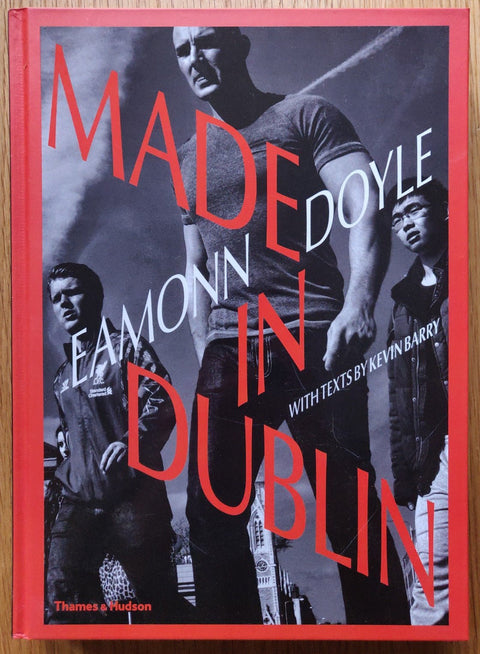 The photography book cover of Made in Dublin by Eamonn Doyle. Hardback in B&W with red border and title.