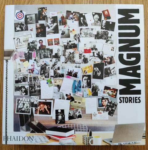 The photobook cover of Magnum Stories. In dust jacketed hardcover white.