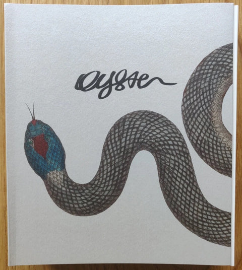 The photography book cover of Oyster by Marco Marzocchi. Paperback with image of a snake on the cover.