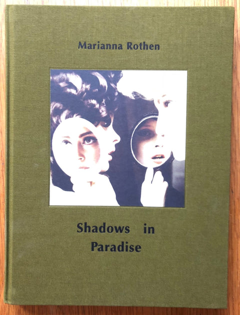 The photography book cover of Shadows in Paradise by Marianna Rothen. Hardback in green.