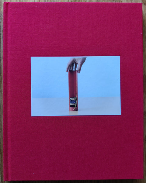 The photobook cover of After by Martin Kollar In hardcover red. Signed