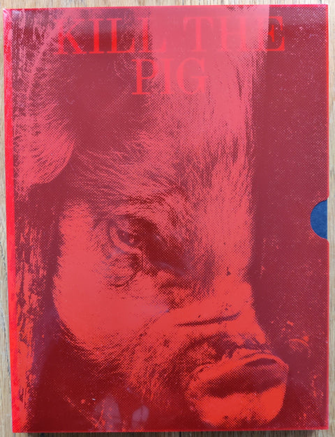 The photobook cover of Kill The Pig by Masahisa Fukase. In hardcover with a pig.
