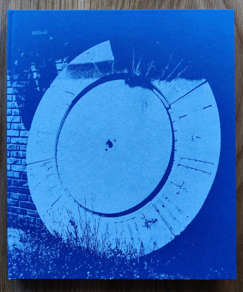 The photobook cover of Sub Sole by Massao Mascaro. In hardcover blue.