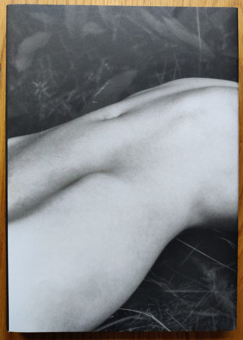 The photography book cover of ELV by Massimo Leardini. Hardback with photograph of a woman's naked torso on the cover.