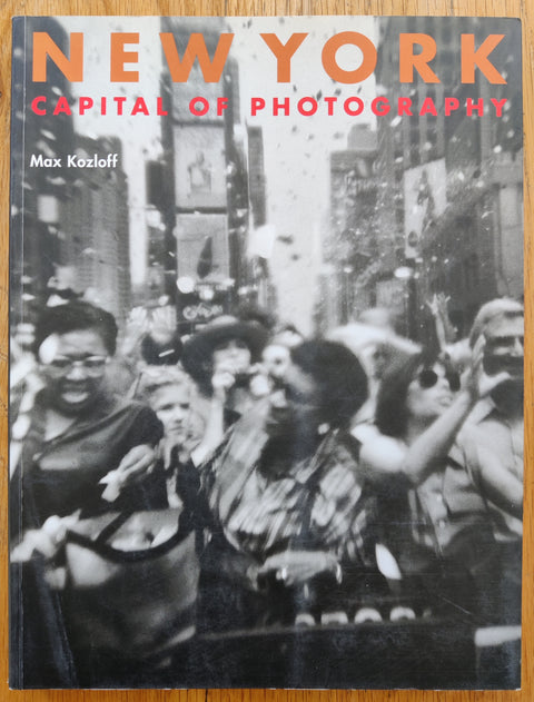 The photobook cover of New York: Capital of Photography edited by Max Kozloff. In softcover black and white.