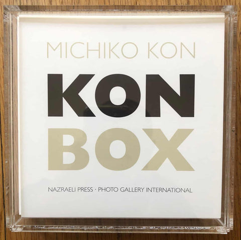 The photography cover of Kon Box by Michiko Kon. Transparent pexiglass box. Signed.