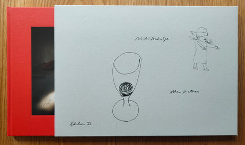 The photography book cover of Other Pictures by Miles Aldridge. Hardback with red border and slipcase in white. Signed.