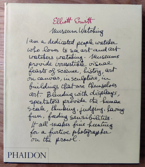 The photography book cover of Museum Watching by Elliott Erwitt. Hardback with handwriting on the cover. Signed.