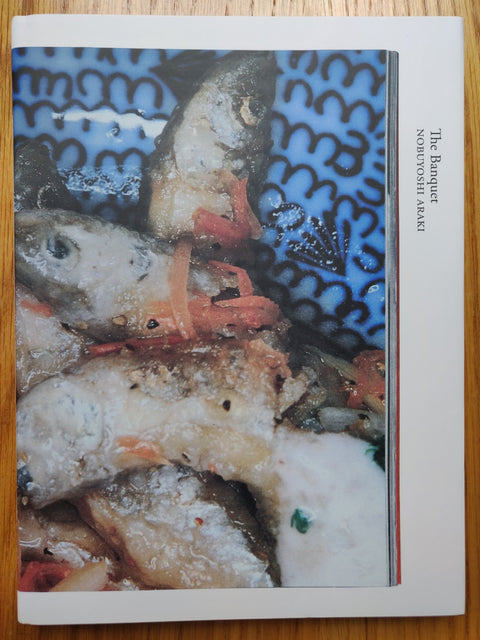 The photography book cover of The Banquet by Nobuyoshi Araki. Hardback with image of fish on the cover.