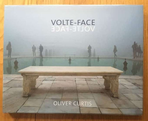 The photography book cover of Volte-Face by Oliver Curtis. Hardback with bench on the front.