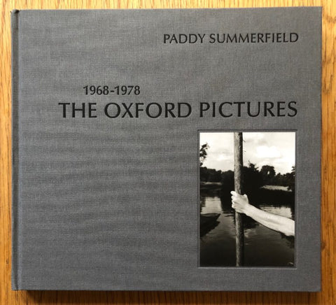 The photography book cover of The Oxford Pictures 1968-1978 by Paddy Summerfield. Hardback in grey.