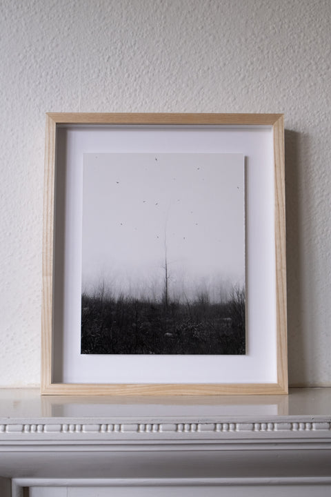 The framed Silver Gelatin Print of Ghost Hill by Paul Guilmoth. In a beautiful floating box frame. Accompanied by a signed artist label. In a limited edition.