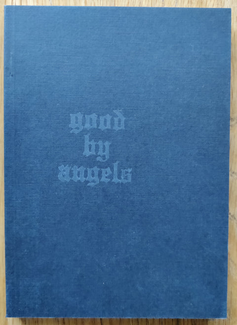 The photography book cover of Good by Angels by Paul Schiek. In softcover black.