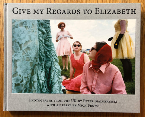 The photography book cover of Give My Regards to Elizabeth by Peter Bialobrzeski. Hardback with photo of a group of women in summer clothes.