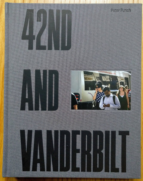 The photography book cover of 42nd and Vanderbilt by Peter Funch. Hardback in grey with black text.