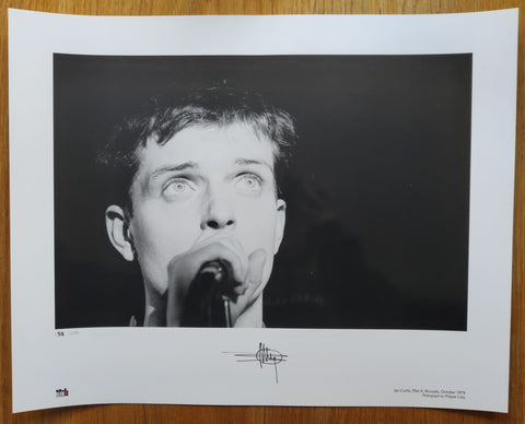 The photography print of Ian Curtis by Philippe Carly. Signed by Carly and accompanied by a certificate of authenticity.