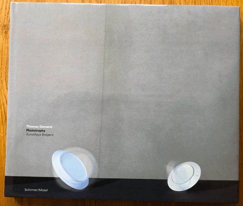 The photography book cover of Phototrophy by Thomas Demand. Hardback in grey and black.