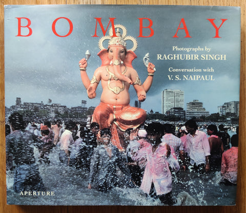 The photography book cover of Bombay by Raghubir Singh. In dust jacketed hardcover grey.