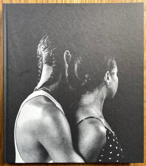 The photobook cover of I Can't Stand to See You Cry by Rahim Fortune. Hardback with image of two people holding each other from the side.