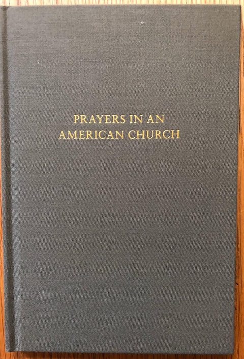 The photography book cover of Prayers in An American Church by Robert Adams. Hardback in brown. SIgned.