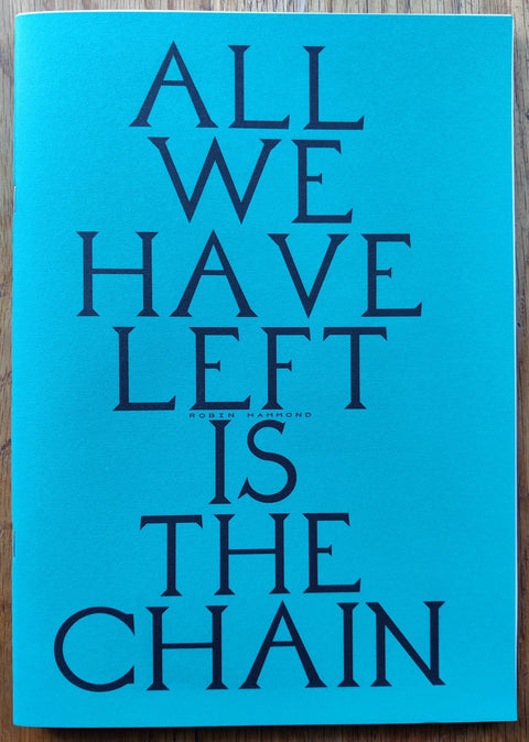 The photography book cover of All We Have Left is The Chain (L'Atelier RisoGraphique 4) by Robin Hammond. Paperback in blue.