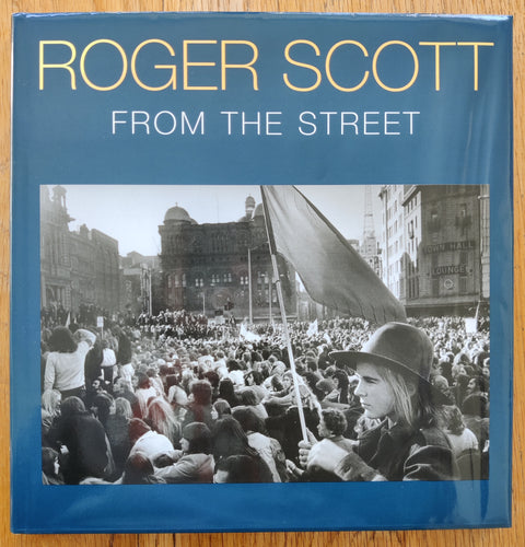 The photography book cover of From the Street by Roger Scott. In dust jacketed hardcover white.
