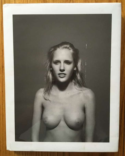 The photography book cover of Everybody Knows this is Nowhere by Ryan McGinley. Hardback black and white.