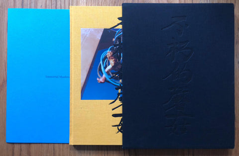 The photography book cover of Immortal Mushroom - Special Edition 2 by Samuel Bradley and Kat Chan. Hardback in yellow with navy blue slipcase. Signed.