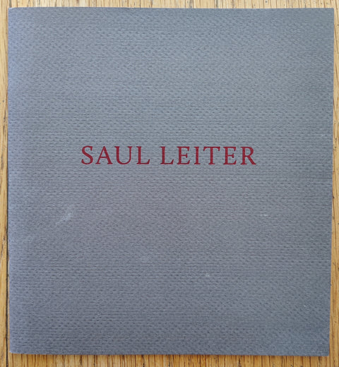 The photobook cover of Saul Leiter. In softcover grey.