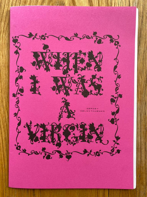 The photography book cover of When I Was a Virgin (L'Atelier RisoGraphique 5) by Sergei Meltnichenko. Paperback in pink.