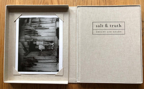 The photography book cover of Salt and Truth by Shelby Lee Adams. Hardback in grey, housed in grey box with signed Print B.